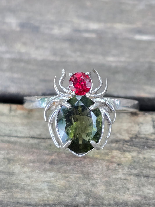 Size 10 moldavite/garnet