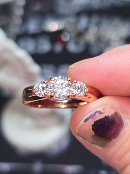 Size 5-9 rose gold over sterling moissanite.